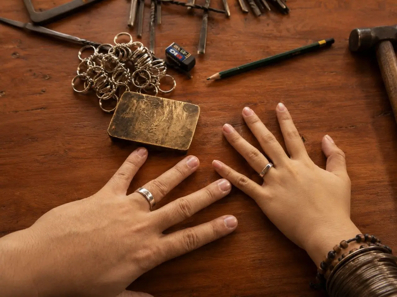 Happy couple showing handcrafted custom silver rings in Sidemen